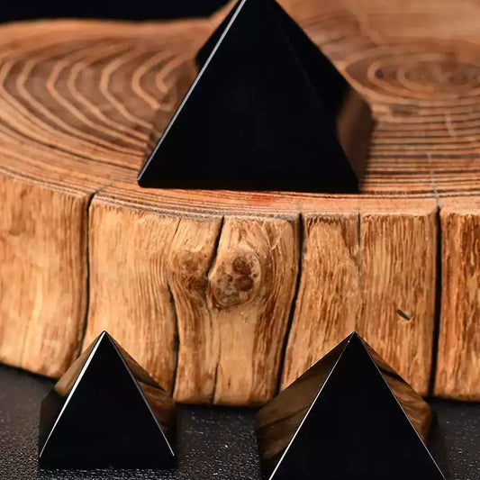 Black Obsidian Crystal Pyramids on Wood