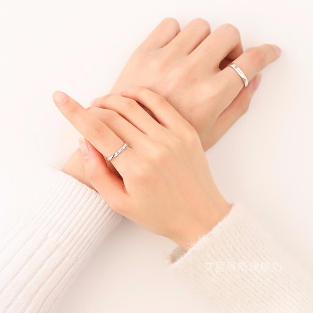 Couple Hands with Engraved Rings Personalized Jewelry