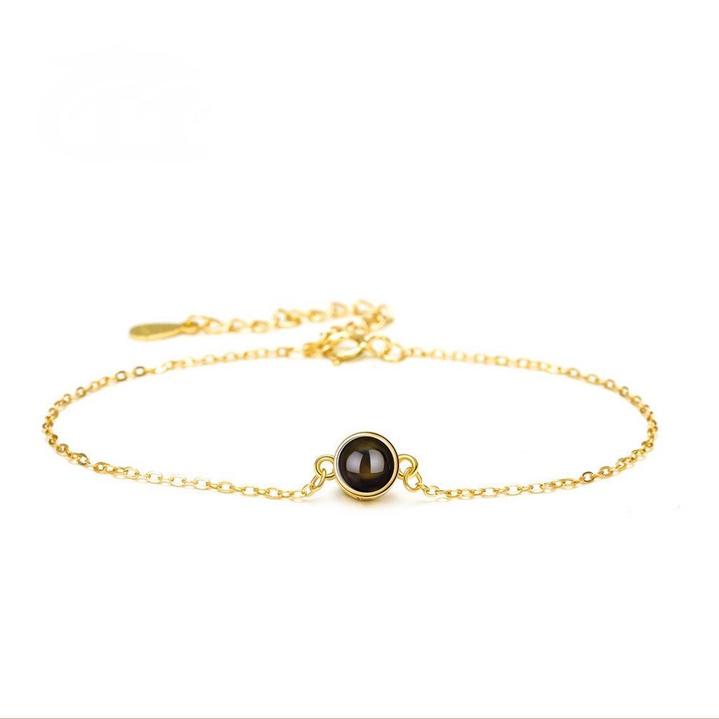 Gold Chain Bracelet with Black Stone Pendant
