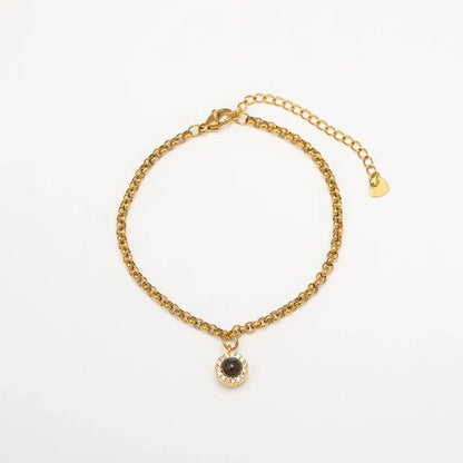 Gold Chain Bracelet with Round Gem Pendant