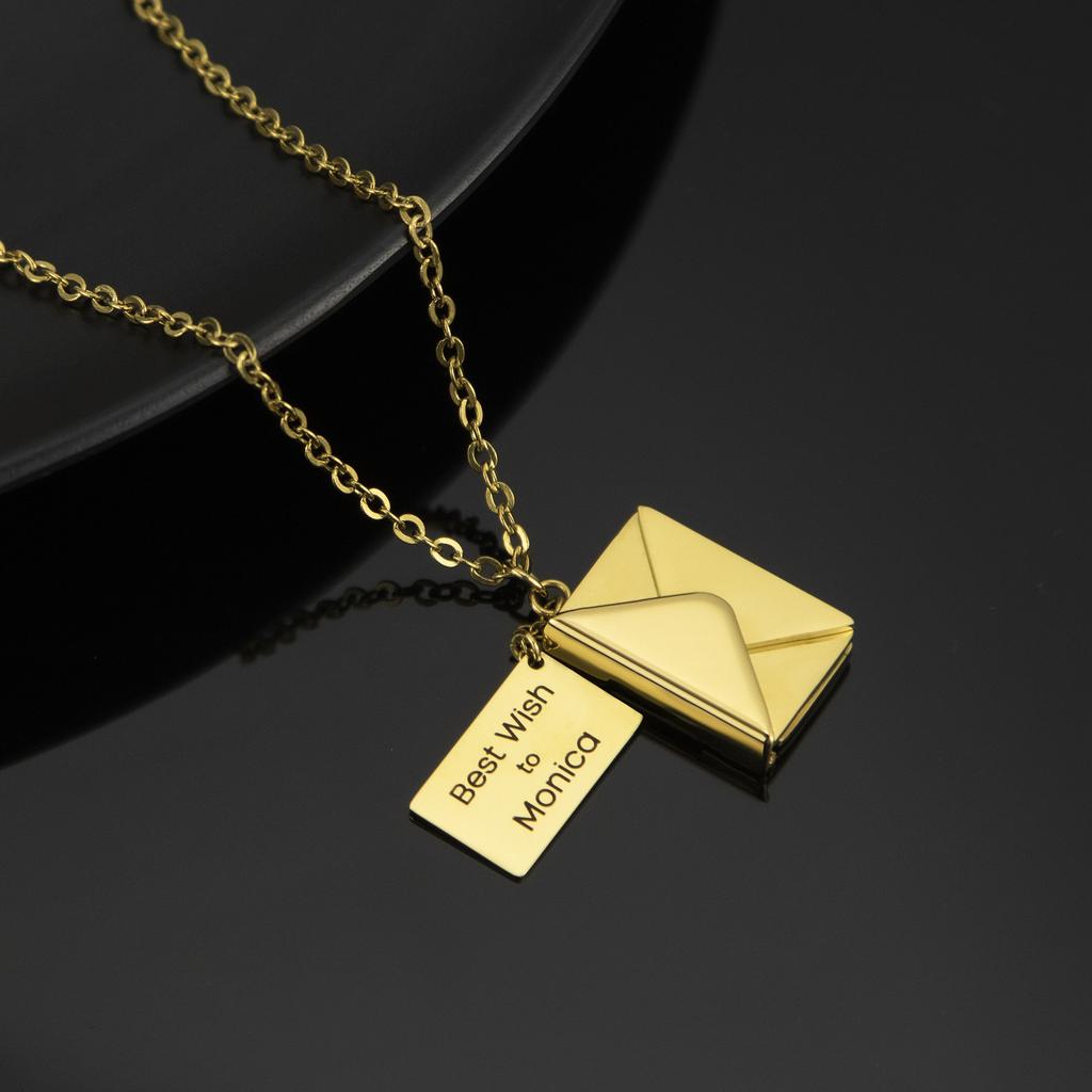 Gold Envelope Locket Necklace Black Background