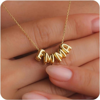 Gold Personalized Name Necklace EMMA Held in Hands