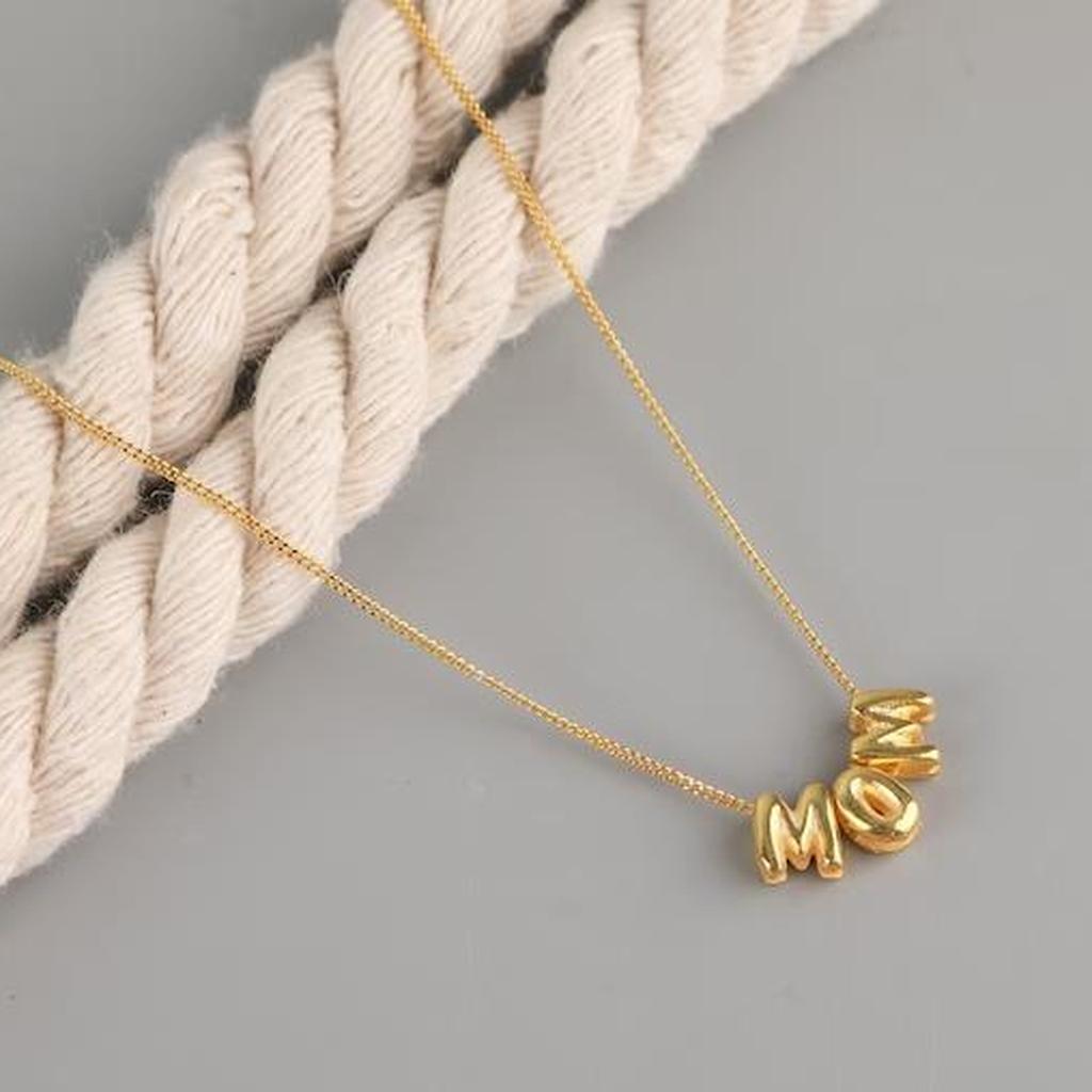 Gold Personalized Name Necklace MOM on Rope Background