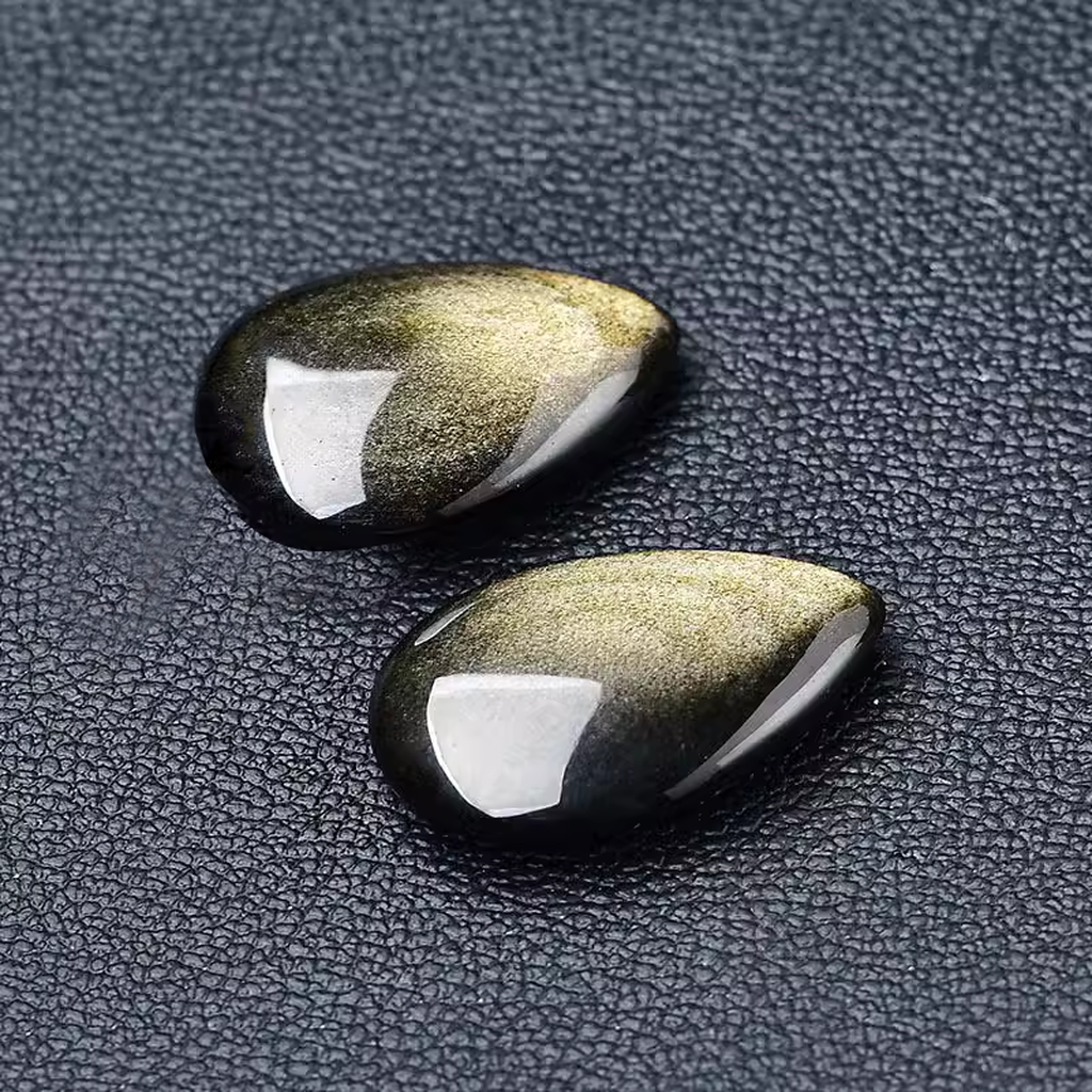 Golden Sheen Obsidian Cabochons Black Background