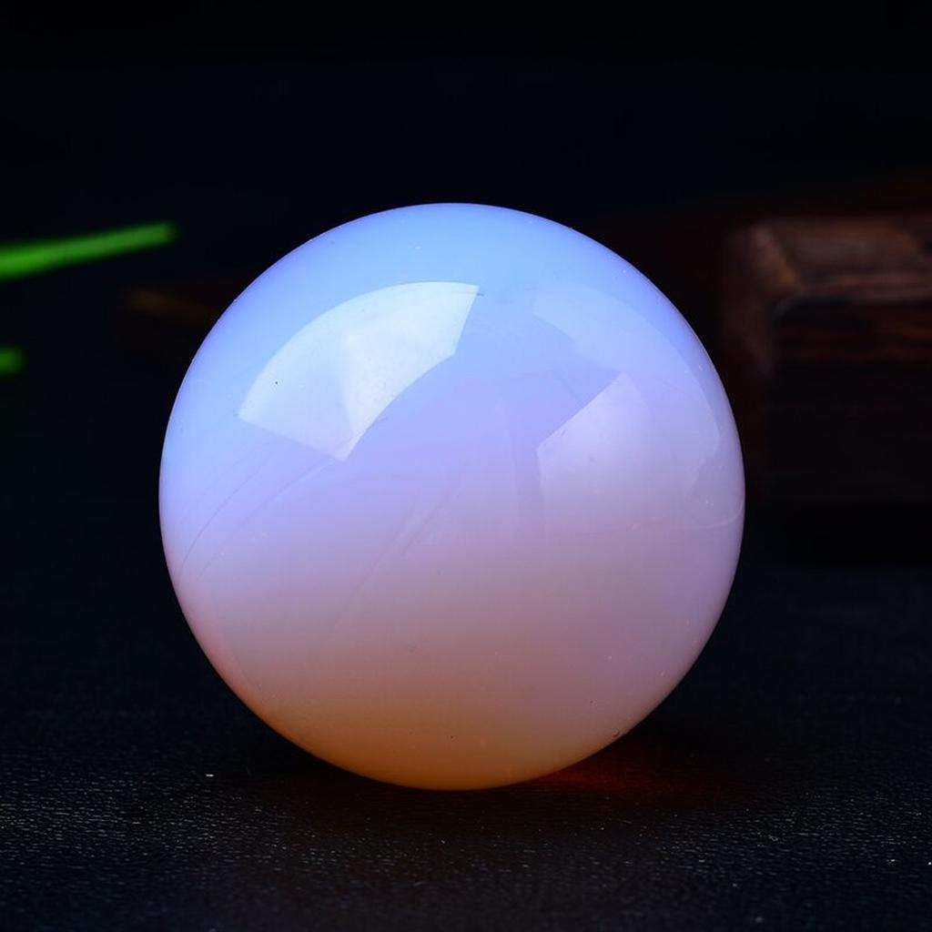 Opalite Crystal Sphere Black Background