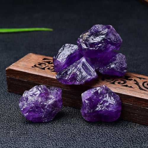 Raw Amethyst Crystal Clusters On Wooden Box
