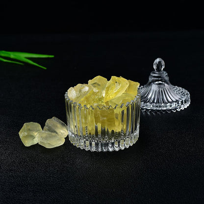 Raw Citrine Crystals Glass Jar Black Background