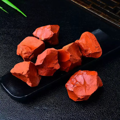 Red Jasper Rough Stones Black Background