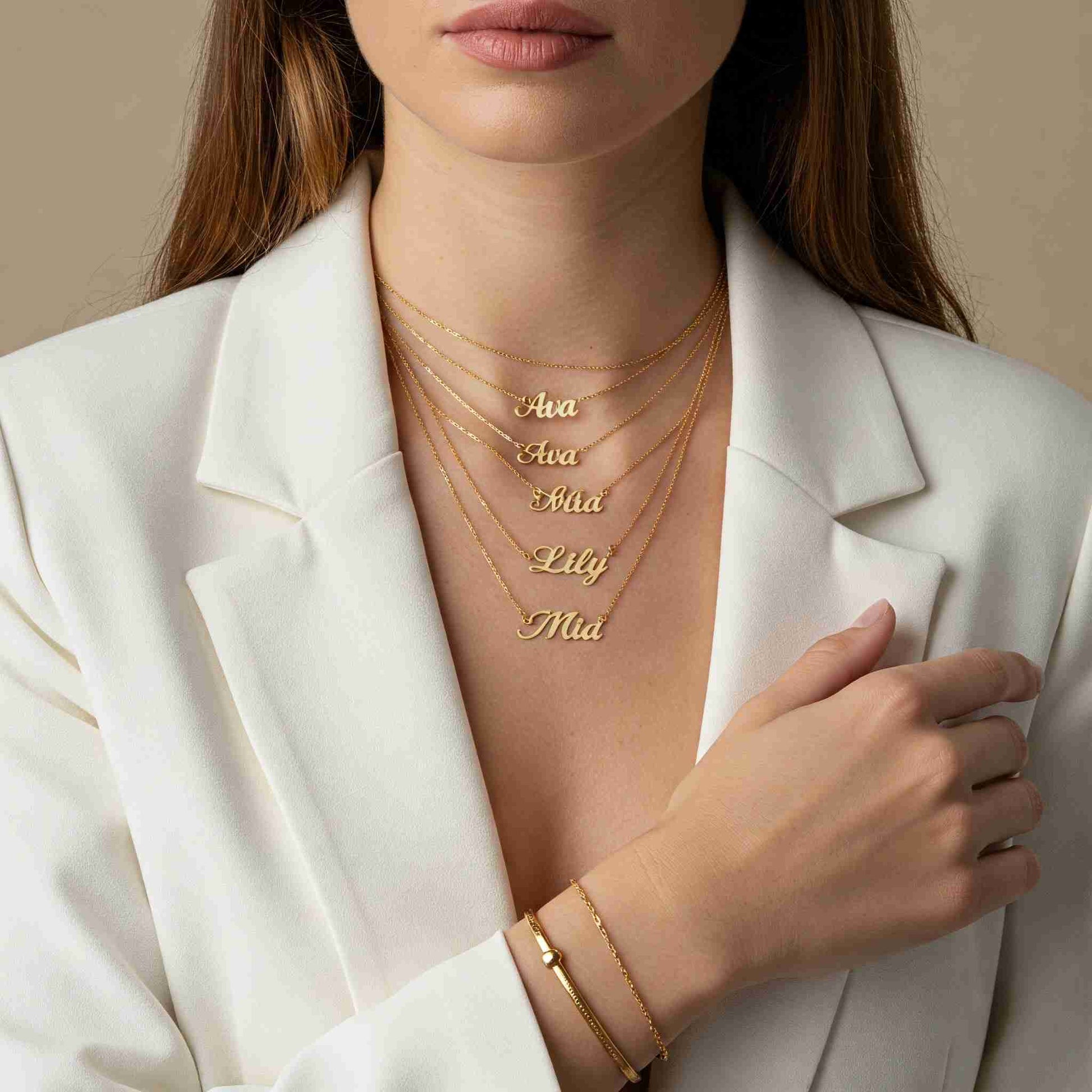 Woman Wearing Multiple Personalized Name Necklaces