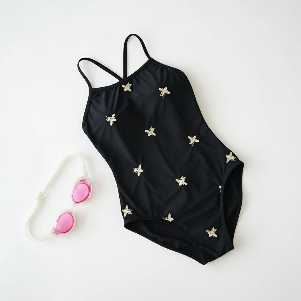 Bee embroidered black one-piece swimsuit, flat lay