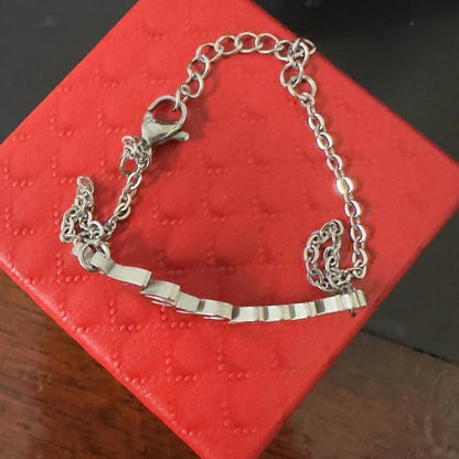 silver chain bracelet on red gift box personalized jewelry.jpg
